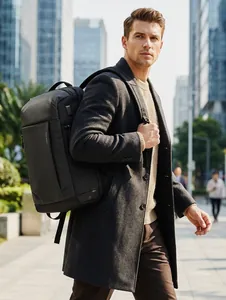 Detail view of water-resistant fabric and side USB charging port on Mark Ryden backpack