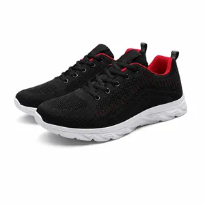 Macro detail of breathable fly-knit mesh and black red texture on lightweight running shoe