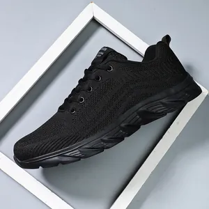 Detailed view of black breathable mesh running shoe with non-slip sole and wave texture