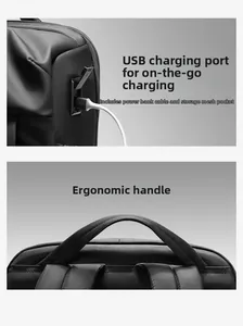 Detail view of business backpack with USB charging port and thick ergonomic top handle