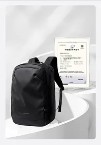 Detail view of water-resistant black business backpack with ergonomic wide shoulder straps