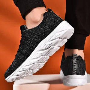 Detail of breathable flyknit fabric and slip-resistant sole on men's running shoes