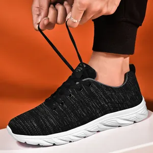 Detail showing the breathable black mesh texture and dynamic white thick rubber sole