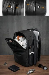 Internal compartments of large capacity backpack holding laptop, headphones and accessories