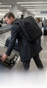 Macro view of anti-theft zipper system and business backpack in airport setting