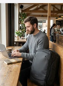 Business laptop backpack with security lock showing professional outdoor cafe use