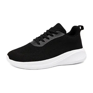 Chaussures de course en mesh noir respirant avec semelle blanche épaisse pour hommes et femmes