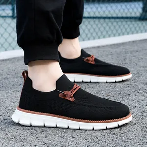 Detail of black breathable knit upper on lightweight men's casual loafers with laces