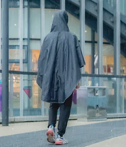 Waterproof hooded rain poncho in dark grey with wide batwing sleeves for outdoor coverage