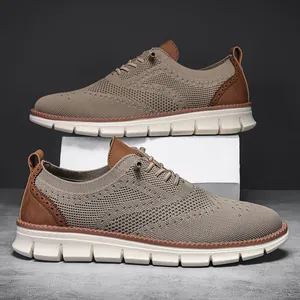 Detail of khaki breathable knit men's loafers with brown leather accents and thick soles