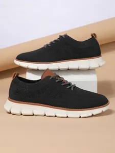Macro detail of breathable fly-knit upper and thick white anti-slip sole on casual men shoes