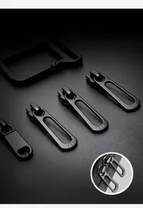 Detail of high-quality YKK matte black metal zippers on a trendy crossbody chest bag