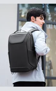 Waterproof business backpack for men with external USB port and side profile view