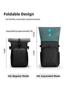 Black waterproof camera backpack with expandable 20L to 30L roll-top capacity detail