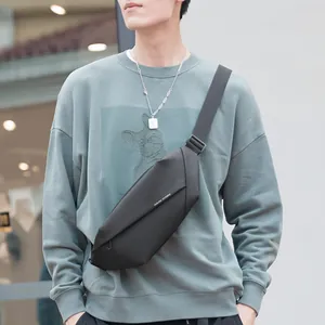Minimalist black crossbody chest bag for men featuring adjustable strap and matte finish