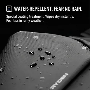 Water-repellent fabric detail on a grey Mark Ryden crossbody bag showing water droplets
