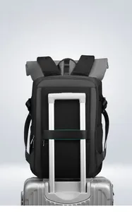 Detail of the breathable mesh back and luggage strap on the black camera backpack