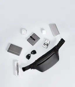 Macro view of water-resistant crossbody bag storing a 7.9-inch iPad and daily gear