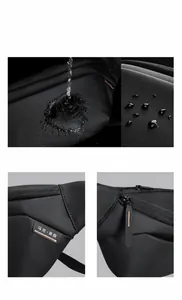 Water-repellent upgraded Oxford fabric detail with Mark Ryden logo on black crossbody bag