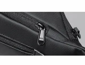 Close-up of premium YKK brand zipper and durable nylon mesh fabric on tactical bag