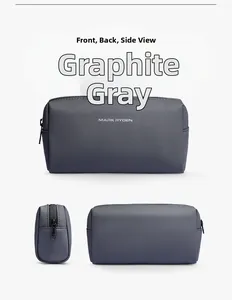 Front and side views of the compact graphite grey portable travel toiletry storage bag