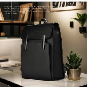 Detail of waterproof black business backpack with matte finish and embossed logo