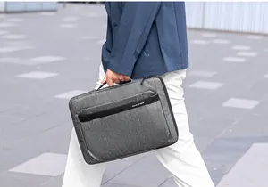 Deep gray Mark Ryden business laptop briefcase with reinforced handle and metal zippers