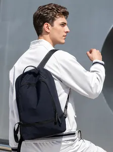 Men's minimalist black water-resistant nylon backpack for daily commuting and travel