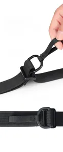 Detail of the adjustable shoulder strap buckle with D-ring on black nylon messenger bag