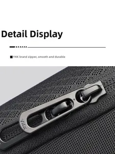 Detail of durable YKK zipper on a premium black men's nylon sling chest bag