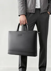 Detailed close-up of a premium black business laptop briefcase with a textured finish