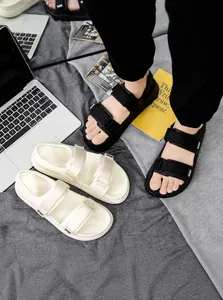 Close-up of double strap sports sandals featuring velcro closure and thick anti-slip sole