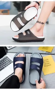 Detail view of double-strap EVA slide sandals featuring SPORT circular logo and thick sole