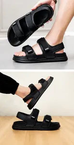 Detail of black sporty sandals with adjustable Velcro straps and non-slip thick EVA sole