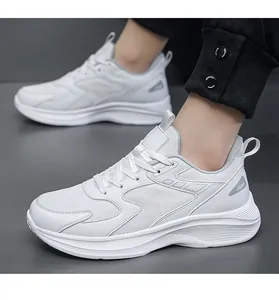 Macro view of white breathable mesh and stitching details on platform sneakers