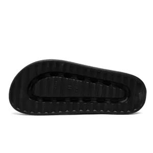 Detail of black EVA sandal outsole with deep non-slip grooves and size 41 marking