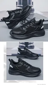 Detail of black breathable mesh sneakers with white JGAK logo and thick anti-slip sole