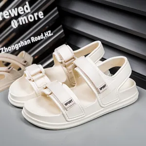 Detailed macro view of the cream EVA thick sole and anti-slip texture of sport sandals