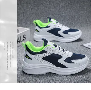 Detail of white and navy sneakers with mesh fabric and neon green inner lining accents