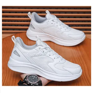 Close-up of white sneakers featuring mesh leather stitching and grey JGAK heel logo