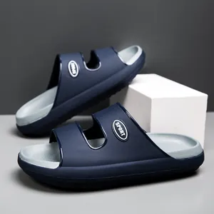 Detail view of navy blue EVA sports slides with double strap design and sport logo
