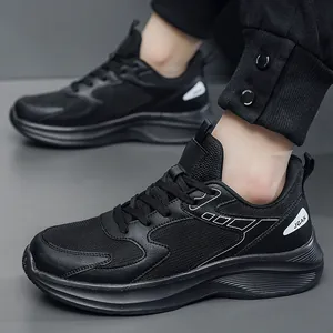 Men's black breathable mesh sneakers with thick cushioned soles and JGAK logo