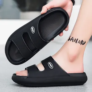 Detail of black EVA slides showing double straps with SPORT logo and thick sole