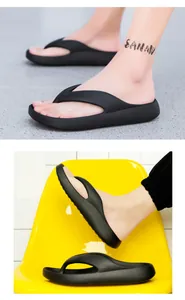Detail view of black EVA platform flip-flops with ergonomic thick sole for men