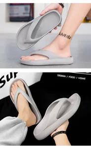 Macro detail of thick EVA foam sole and minimalist grey flip-flop strap for men