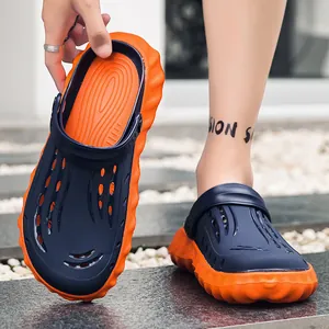 Heren clogs met dikke zool in blauw-oranje, ademend EVA-bovenwerk en golvende zool voor grip