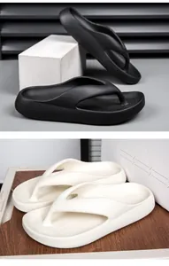 Close-up of EVA thick platform flip flops with ergonomic footbed in black and white