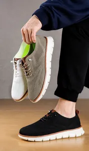 Close-up of breathable knit loafers for men in white, khaki and black stylish colors