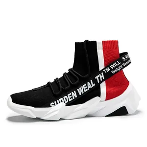 Detailed close-up of high-top sock sneakers with red and black knit and thick white sole
