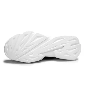 Close-up of white EVA sneaker sole featuring geometric anti-slip tread pattern